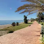 Beachfront 4-Bed Pet-Friendly Poolside Top Flat