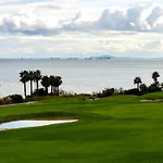 Close To The Marina And Beaches Of Sotogrande, Experience Sophistication In This Contemporary Four-Bedroom Frontline Golf Townhouse In The San Roque Club
