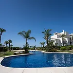 Front-Line Garden Apartment In Palm Beach, Marbella
