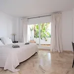 Front-Line Garden Apartment In Palm Beach, Marbella