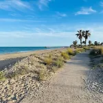 Adosado En La Playa Con Piscina