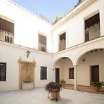 El Anfitrion - Palacio XVIII