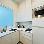 Qe Apartments